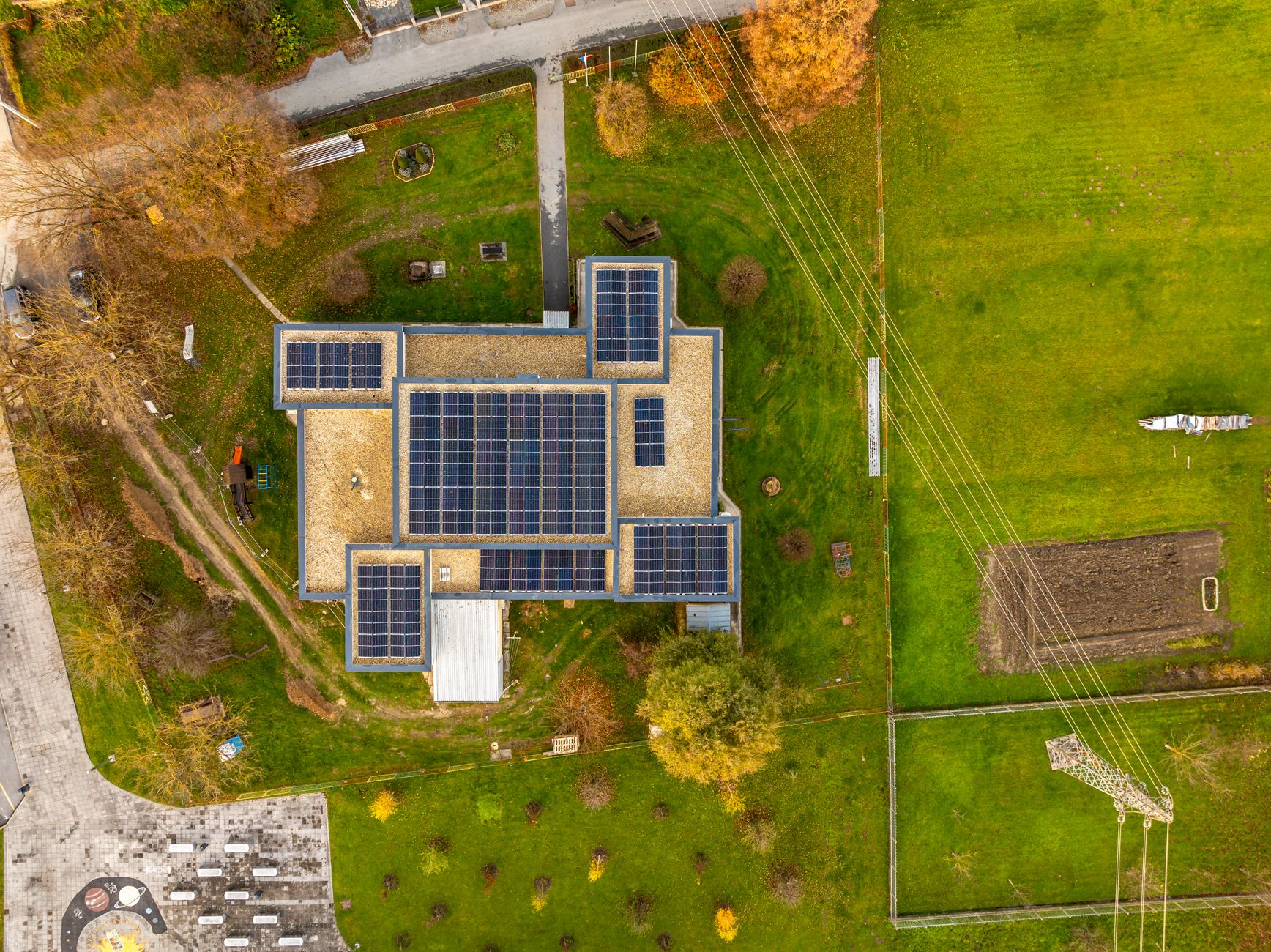 Solar panels on a modern council housing estate in Wales, showcasing renewable energy integration