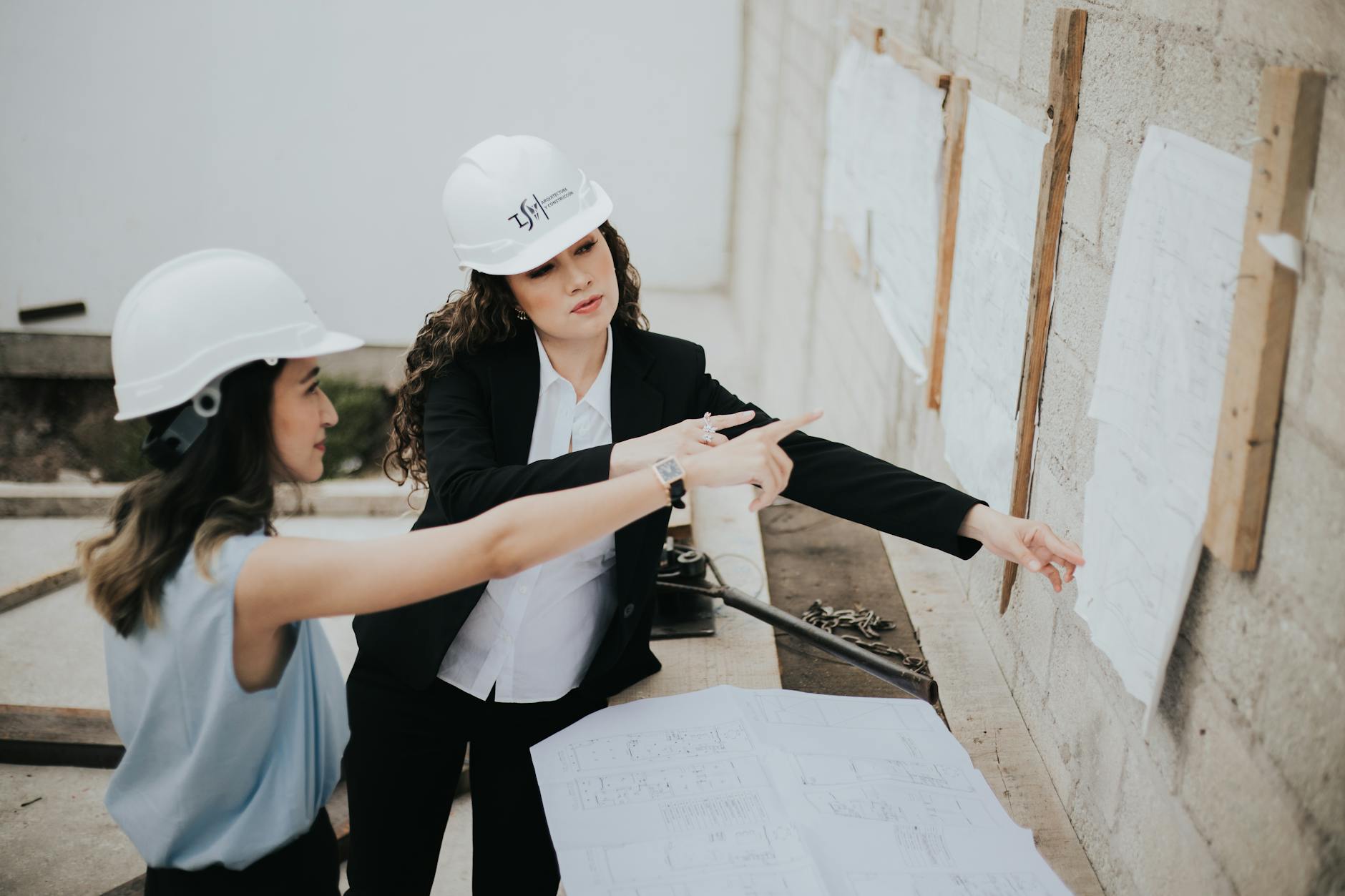 Housing association team reviewing plans