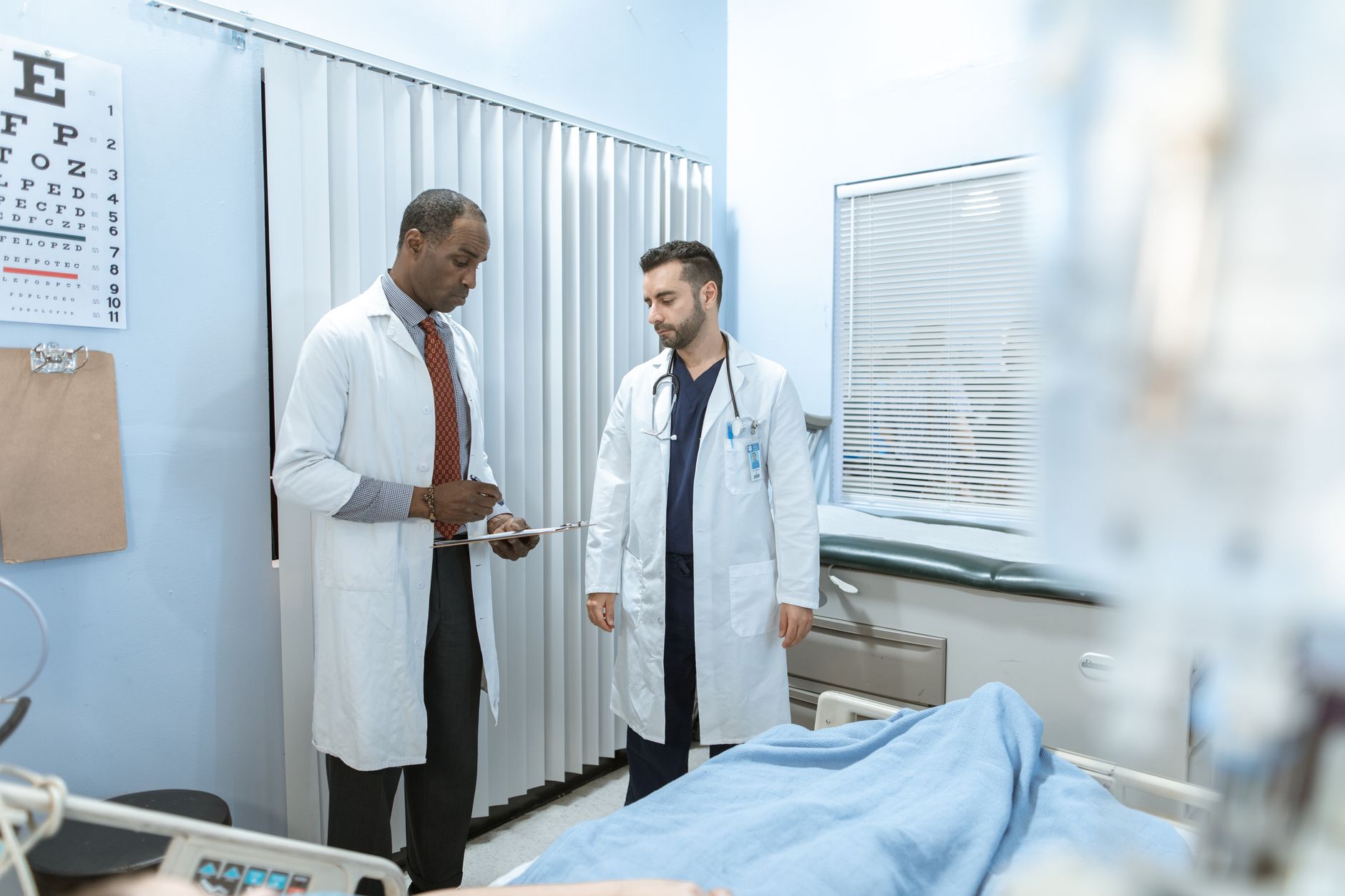 Healthcare professional discussing housing options with a patient