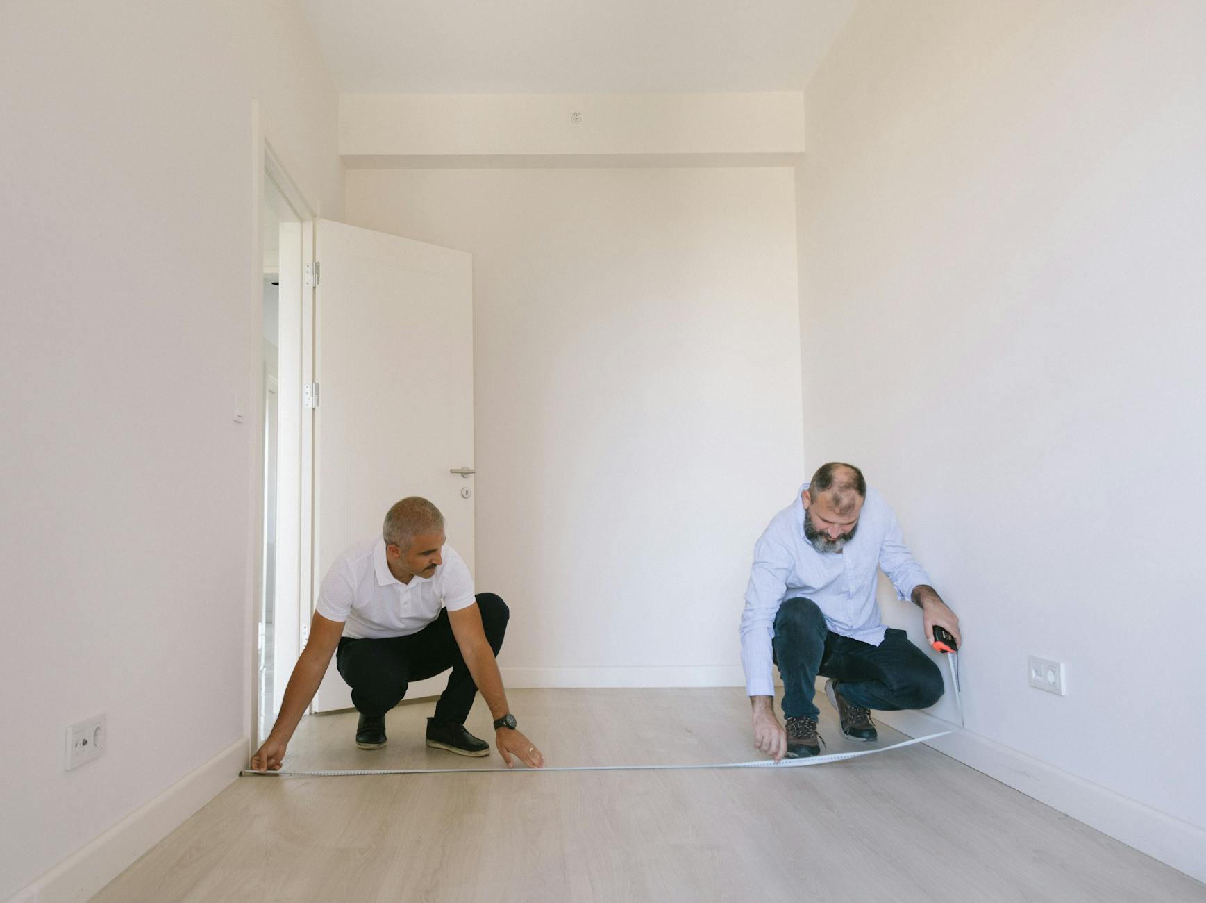 Social housing bedroom with measuring tape - illustrating space requirements