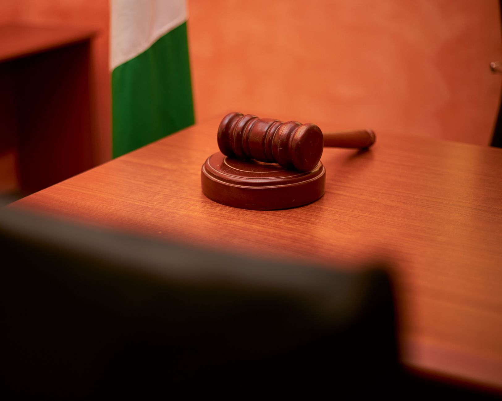 Regulatory judgement document on desk with housing association logo visible